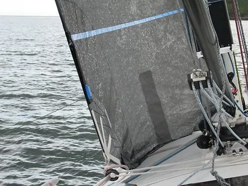Close-up of a jib's clew and inhauler line showing the mesh-look X-Drive® membrane cloth