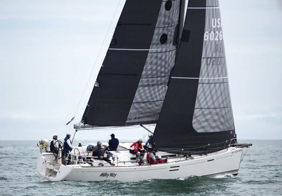 Dufour 40E Milky Way racing under grey mainsail and genoa with a partial taffeta leech