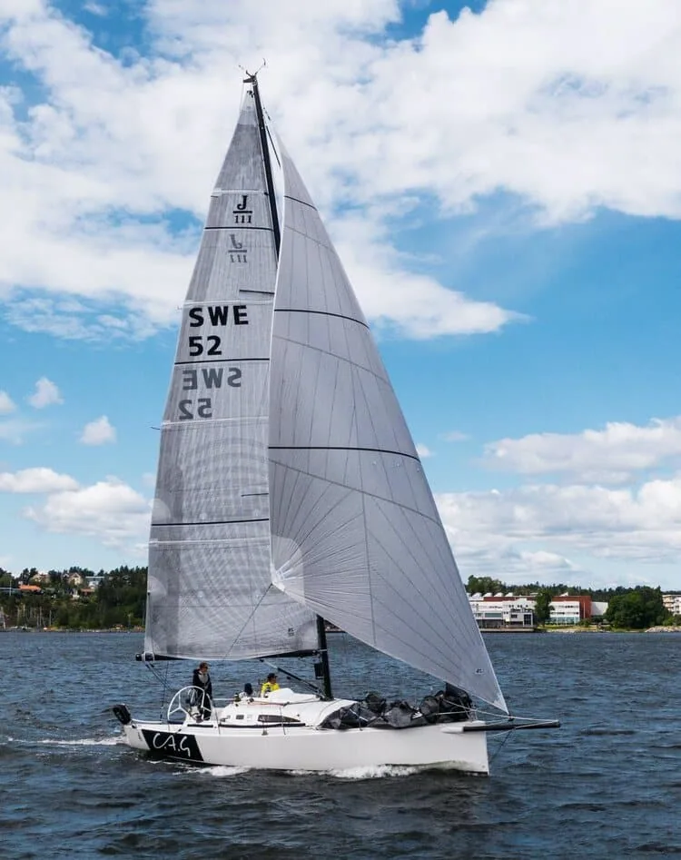 J/111 reaching under her Jib Top, sail number SWE 52