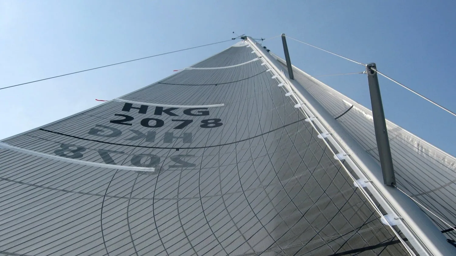View up a Tape-Drive mainsail's grid of load tapes, sail number HKG 2078