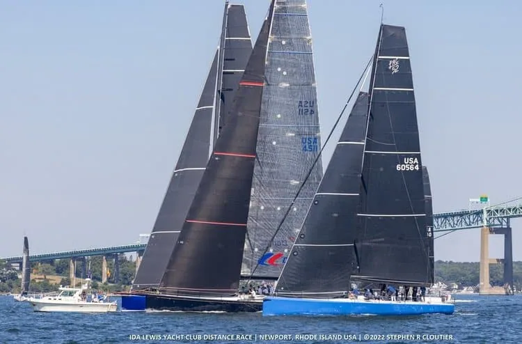 Offshore racing fleet under black sails starting the Ida Lewis Yacht Club Distance Race