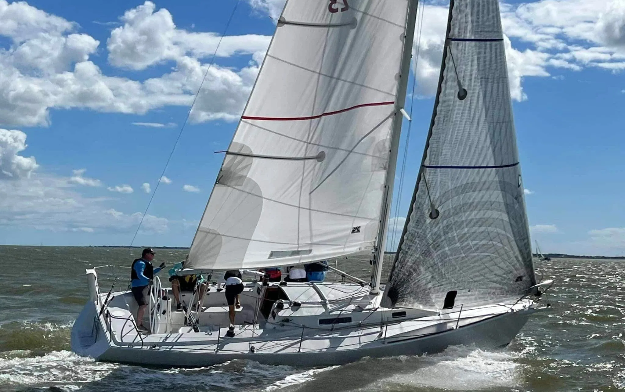 Scott Spurlin's J/105 Yolo close-hauled under a mesh-look genoa at J/Fest Southwest