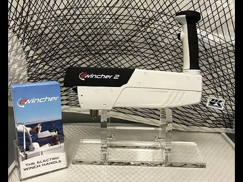 Ewincher 2 electric winch handle displayed on a stand next to its box