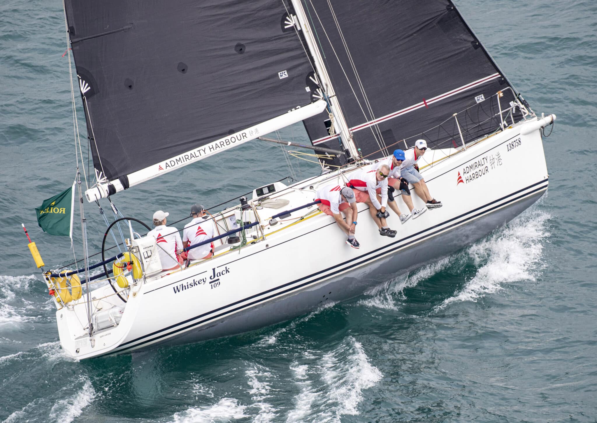 J/109 Whiskey Jack powers upwind with black sails during the China Sea Race