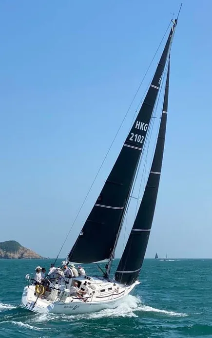 J/109 Whiskey Jack sails close-hauled in Hong Kong waters