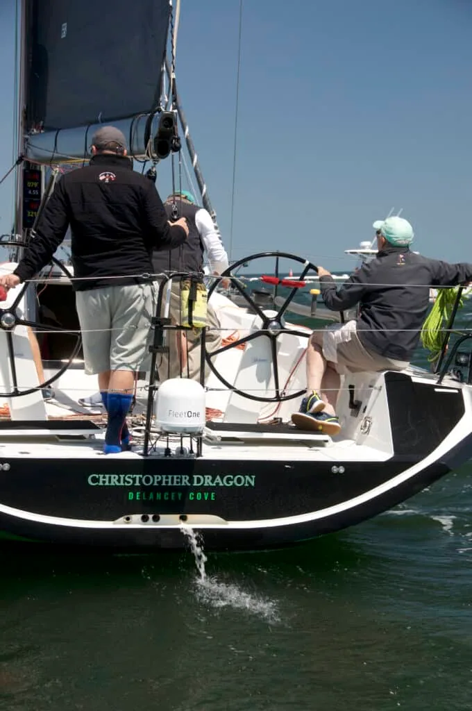Crew works the pit near Christopher Dragon's transom, Delancey Cove home port