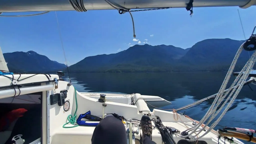 View from Geneva's cockpit toward mountains during a calm R2AK day