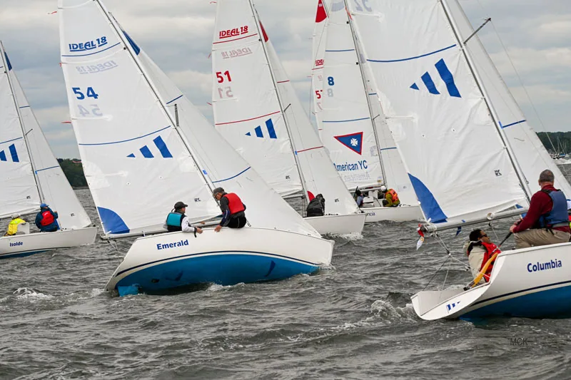 Ideal 18 fleet reaching hard off the start line in a breezy race at the Robie Pierce Regatta