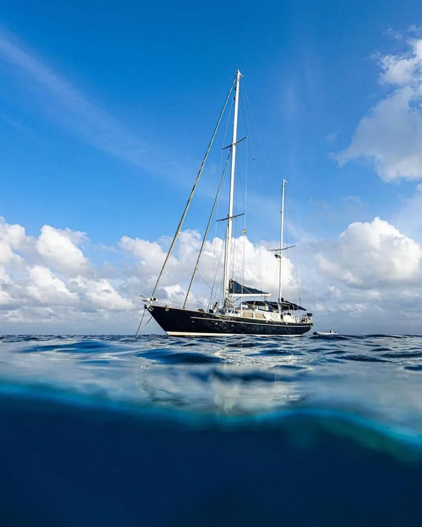 View from RESILIENCE's cockpit underway, mainsail up and deck gear laid out
