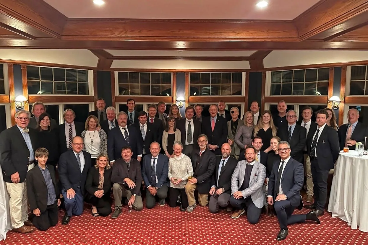 Group photo of UK Sailmakers loft managers and staff at the 2023 meeting dinner