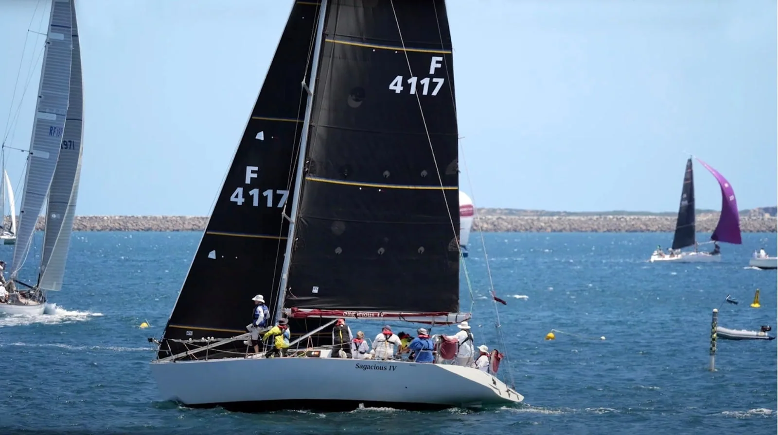 SAGACIOUS IV racing under black sails at the 2023 Cockburn Sound Regatta