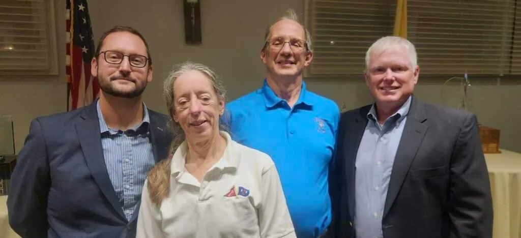 The 2023 Keyworth Yacht Club season champions are, (L to R) - Greg Kotzas, Division 1, sailing OSPREY a J/35, Diane Blondell, race committee chairperson, Terry Sculac, Navigator class champion, racing NAUTI-LASS, a Jenneau 45, and Bill Mulholland, winner of the Division 2 class, sailing CELTIC STAR, a Sabre 34.