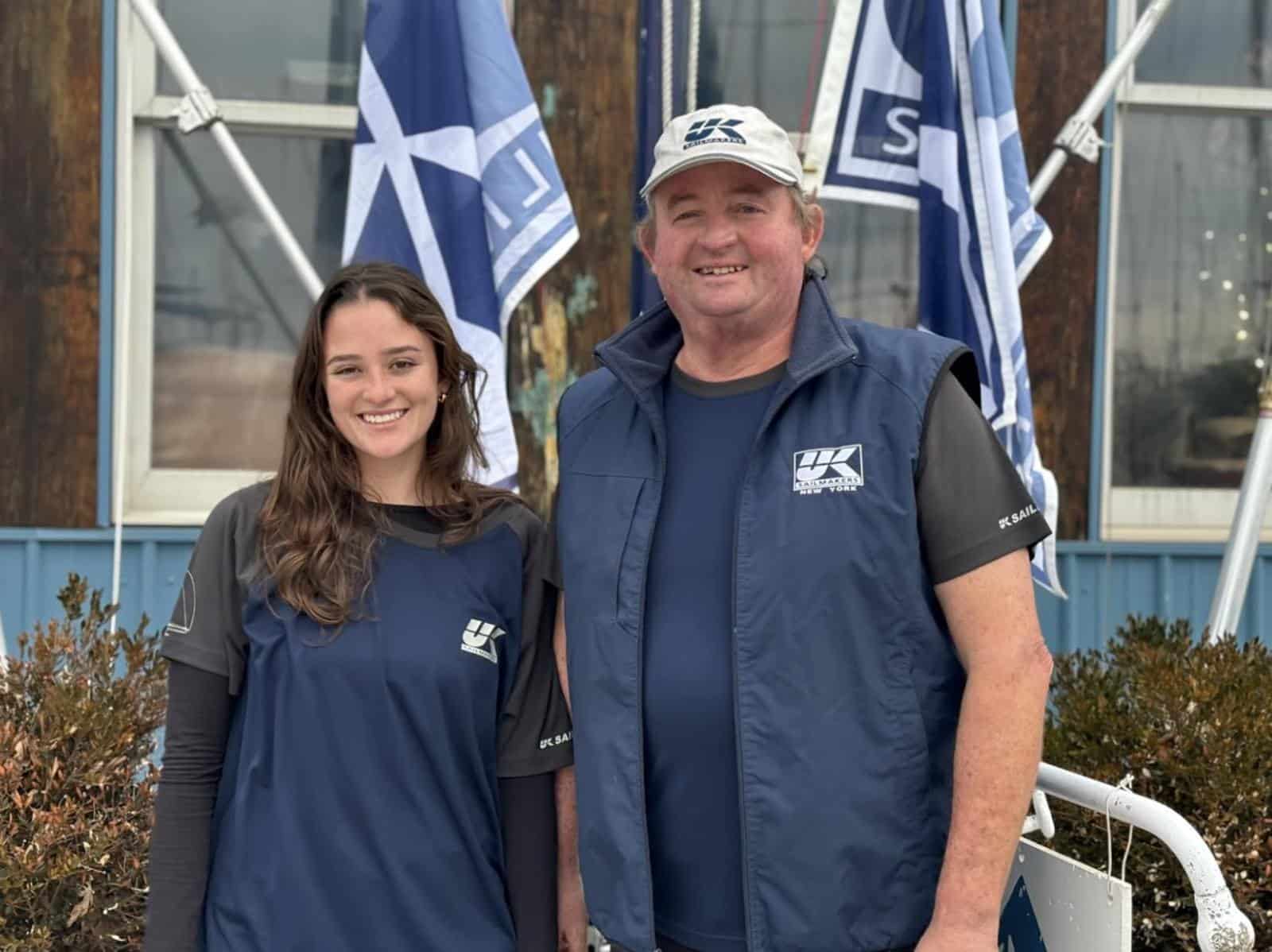 Two UK Sailmakers Chesapeake staff members posing in loft-branded gear