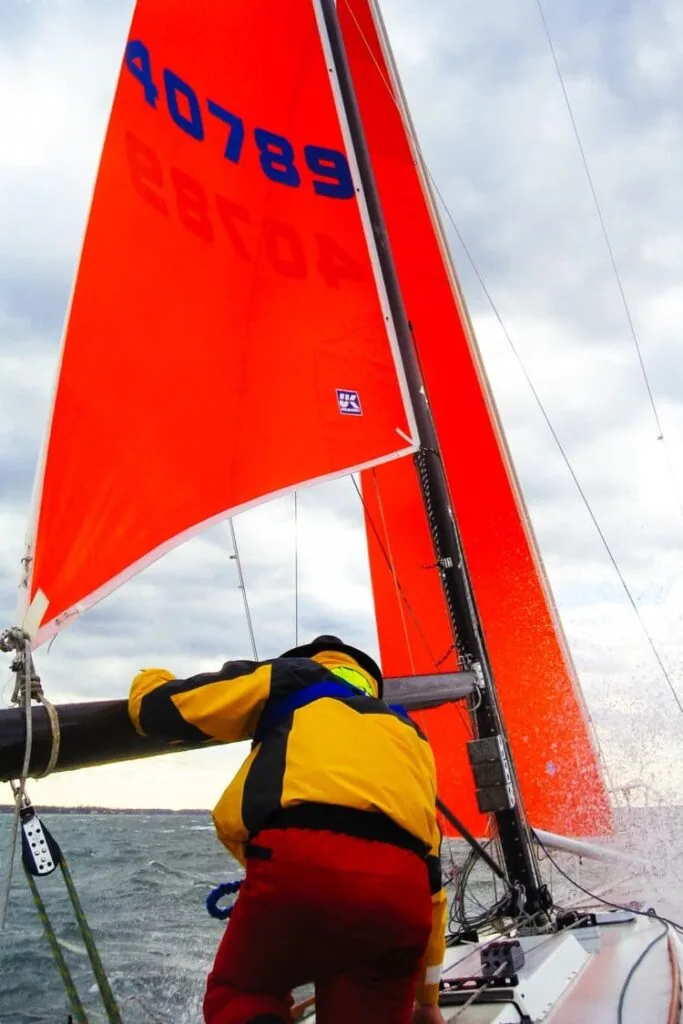 A storm trysail with its clew attached to the boom