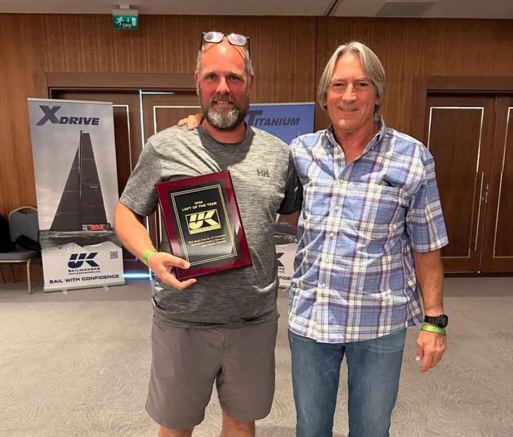 Michel Lefebvre Jr. of UK Sailmakers Belgium receiving the 2024 Loft of the Year award