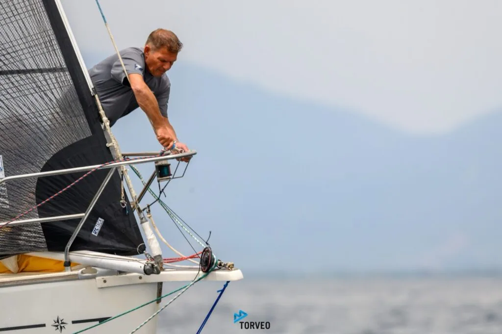 Glenn De Brouwer working the foredeck on DIABOLIC's bow