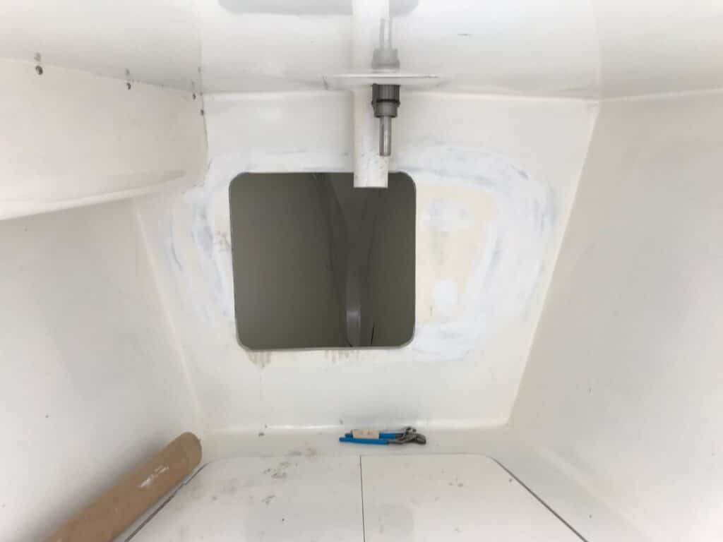Enclosed ring frame around a hull access hatch, seen from inside the newly refitted hull