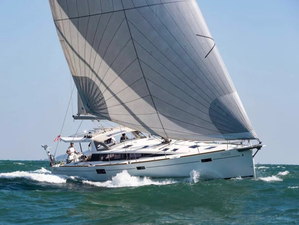 Cruising yacht reaching under a full gennaker and mainsail