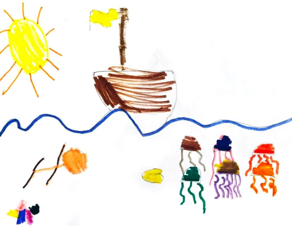 Marker drawing of a boat with a yellow flag, sun, jellyfish, and stick-figure people