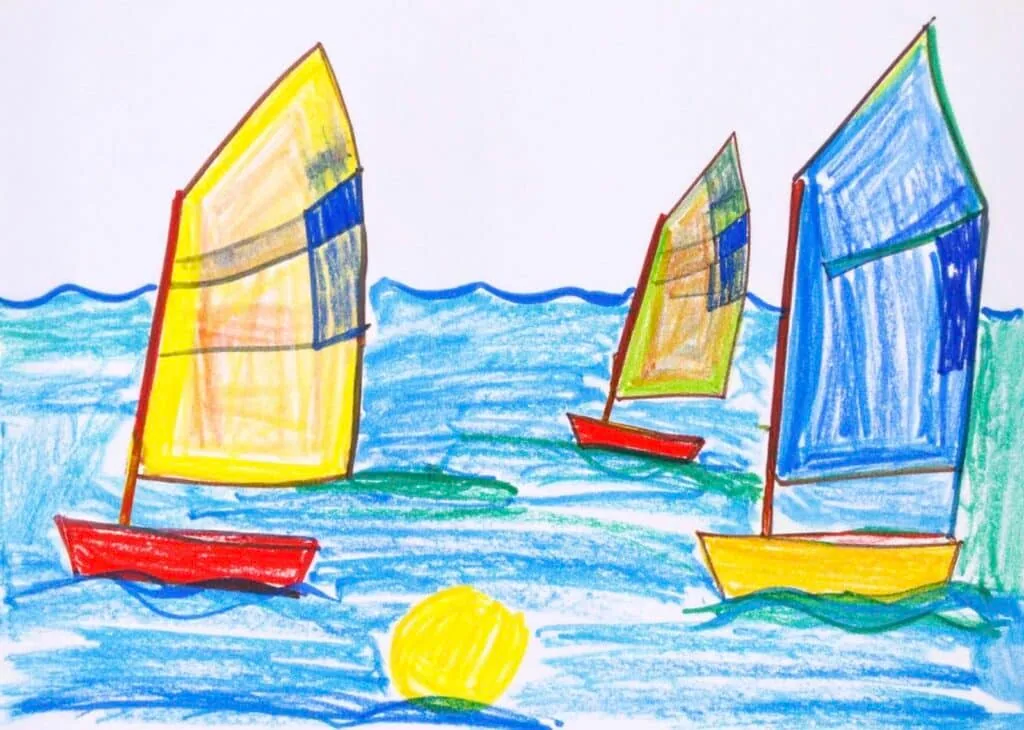 Child's crayon drawing of a sailboat with rainbow-striped sails on blue water