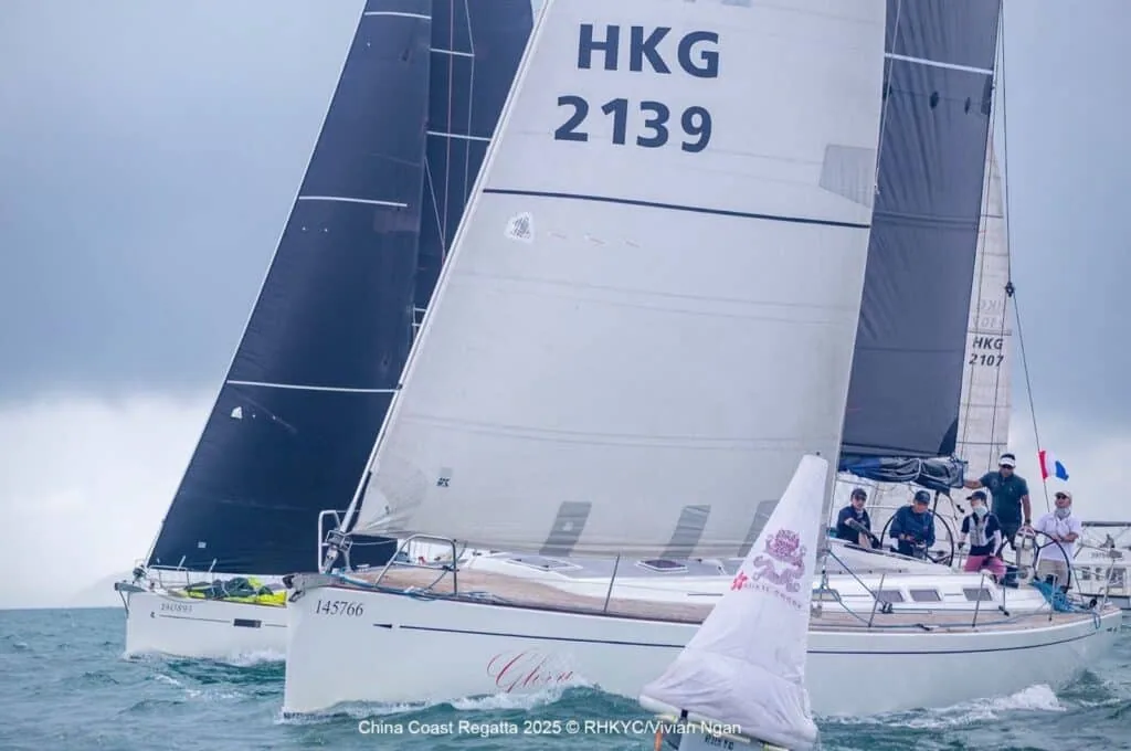 Yachts HKG 2139 and fleet close racing at the China Coast Regatta under grey skies