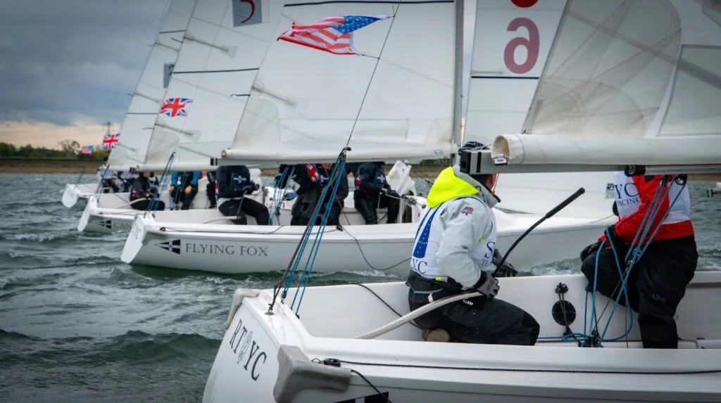 Team-racing keelboat Flying Fox reaching close alongside its rivals