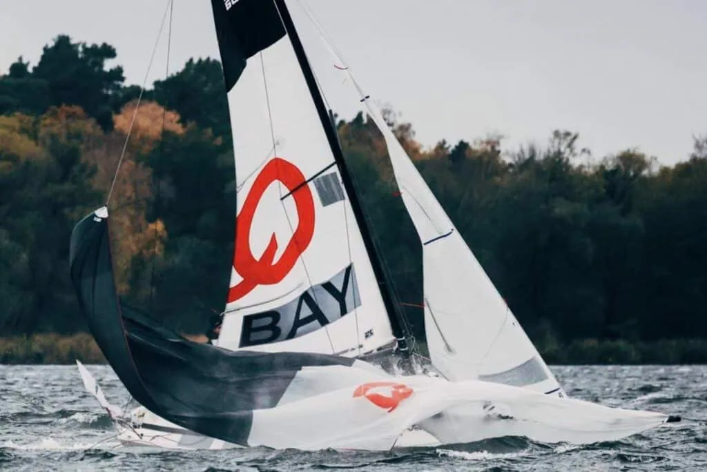 J/70 knocked flat with its spinnaker collapsed in the water at the Bundesliga Finals