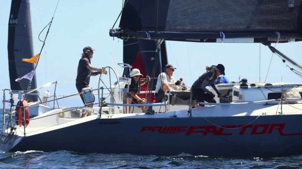 Crew working the foredeck of Prime Factor during a fleet race