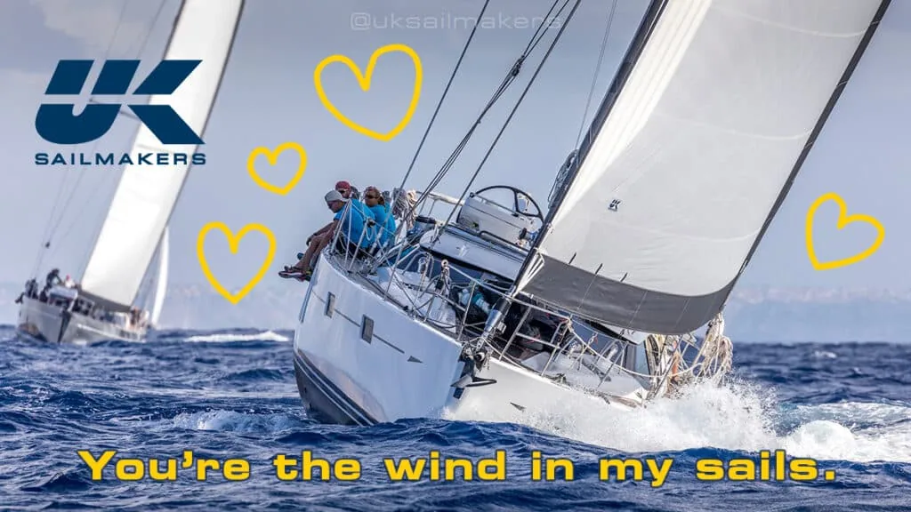 Valentine graphic over a heeled cruiser: 'You're the wind in my sails.'