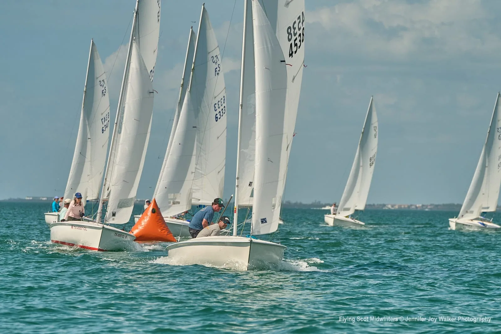 Flying Scot #4538 leading the fleet around the top mark