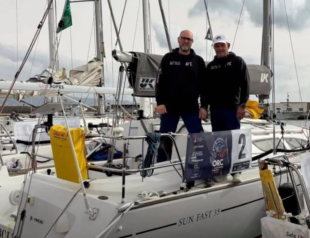 Diabolic team crew stand on their Sun Fast 35 dockside before racing