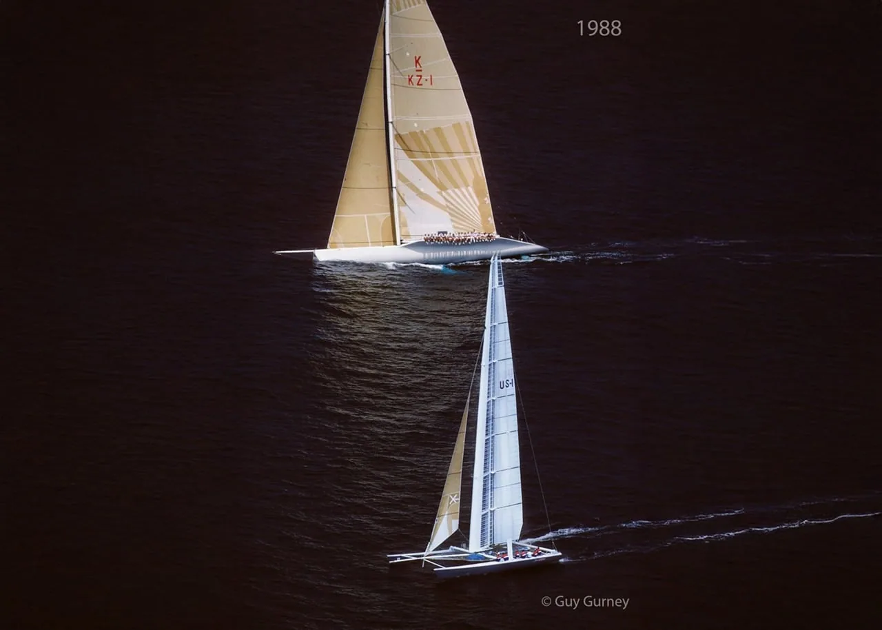 1988 America's Cup: New Zealand's KZ-1 monohull passes the US catamaran