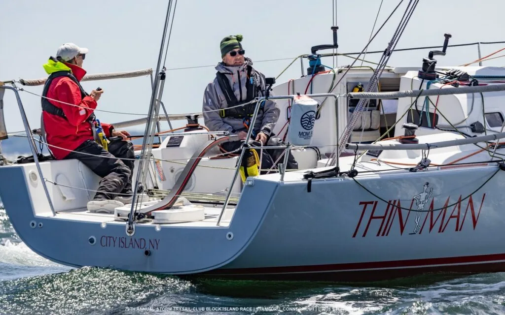 Thin Man's cockpit crew at the helm, hailing port City Island, NY