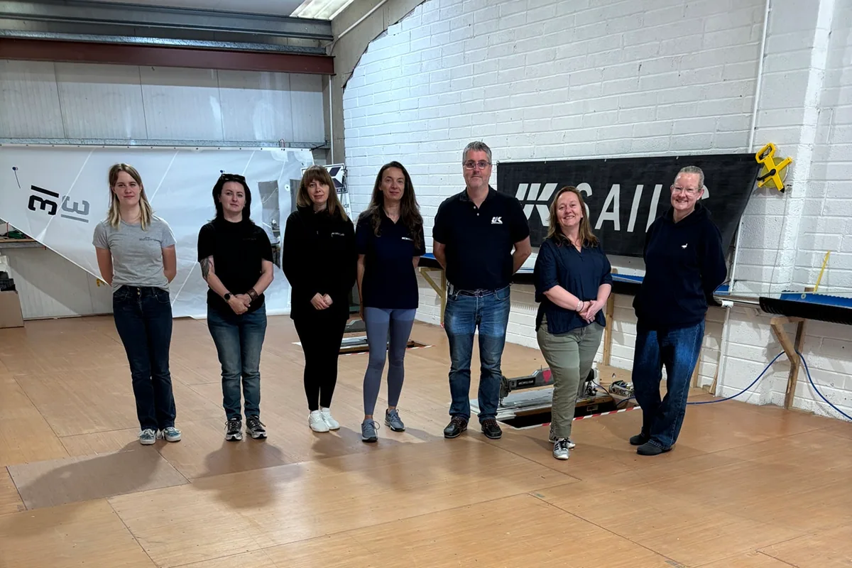 UK Sailmakers Ireland team poses together in the sail loft