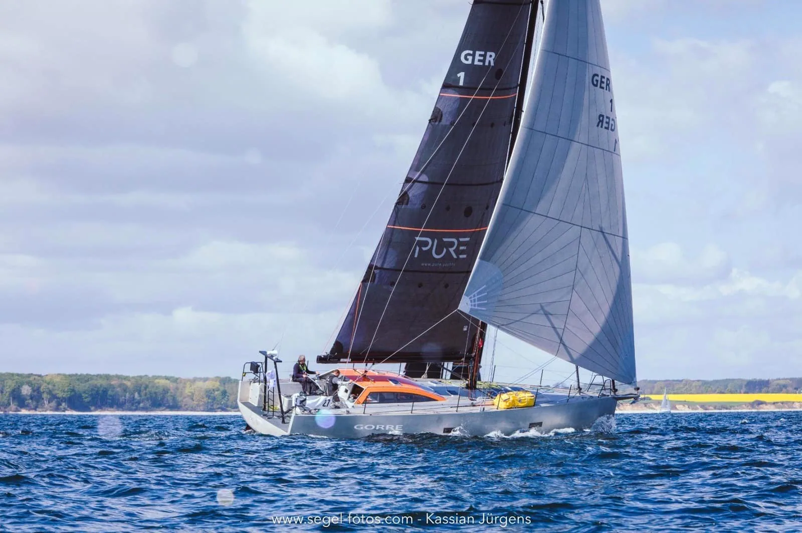 PURE 49 Gorre reaching under a grey mainsail, sail number GER 1