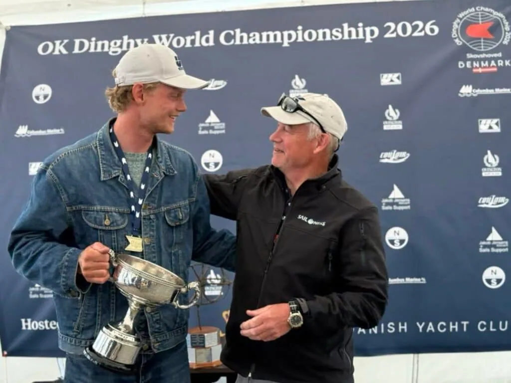 Left: Johan Schubert at the 2026 OK Dinghy Worlds. Photo © Robert Deaves. Right: Johan Schubert and Morten Ullman at the awards ceremony. 