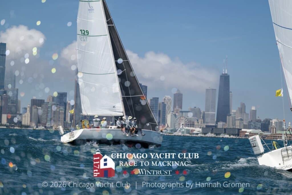 Sail No. 129 races past the Chicago skyline at the Mackinac start