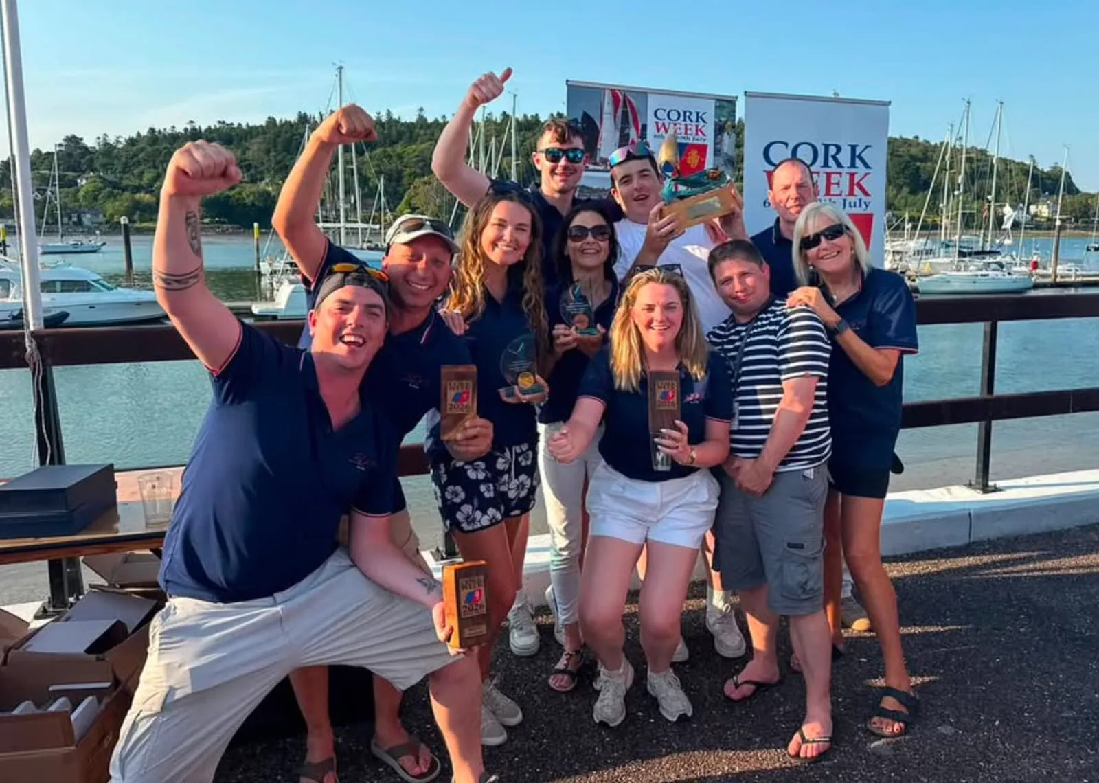 Big Mac's crew celebrates with trophies at the Cork Week prize-giving