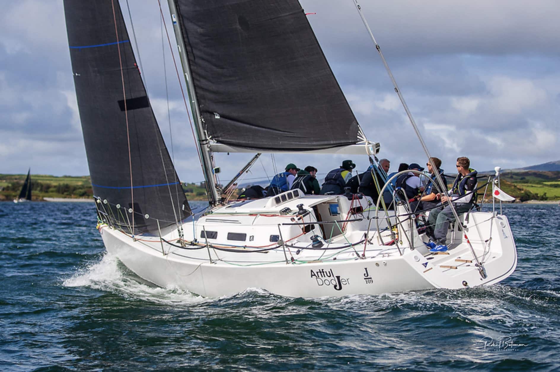 Artful DodJer, a J/109, sails under a dark mainsail at Calves Week