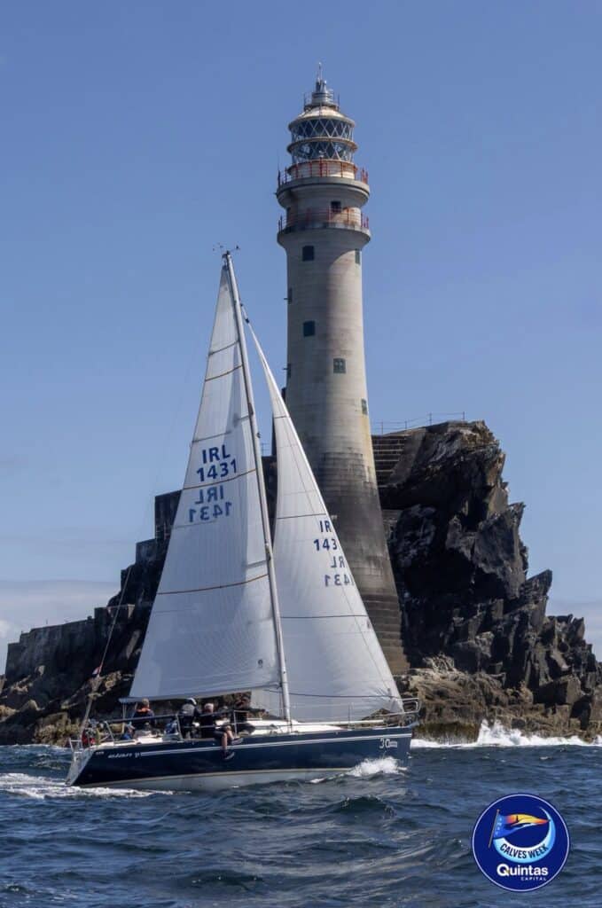 IRL 1431 passes directly beneath the Fastnet Rock lighthouse
