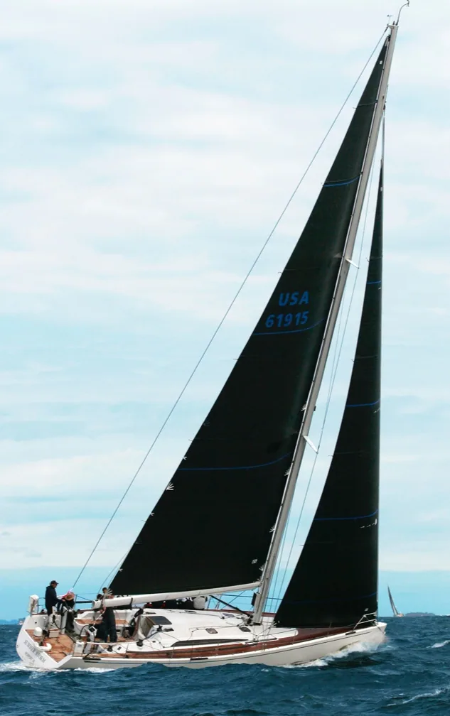 Marten 49 SUMMER STORM sailing upwind under black mainsail and genoa, sail number USA 61915, crew on the rail