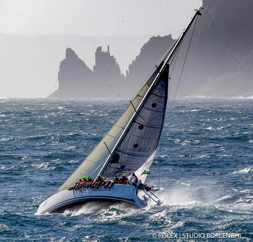 Salona 44 ANGER MANAGEMENT heeled in rough seas under a reefed mainsail and No. 4 genoa below the Organ Pipes