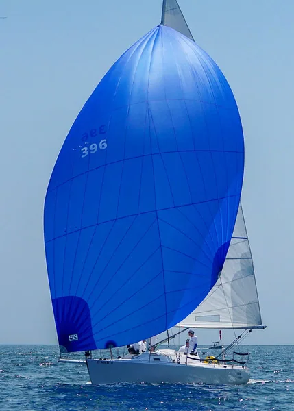 J/105 FINAL FINAL, 396, running under a royal-blue asymmetric spinnaker and white mainsail in light air