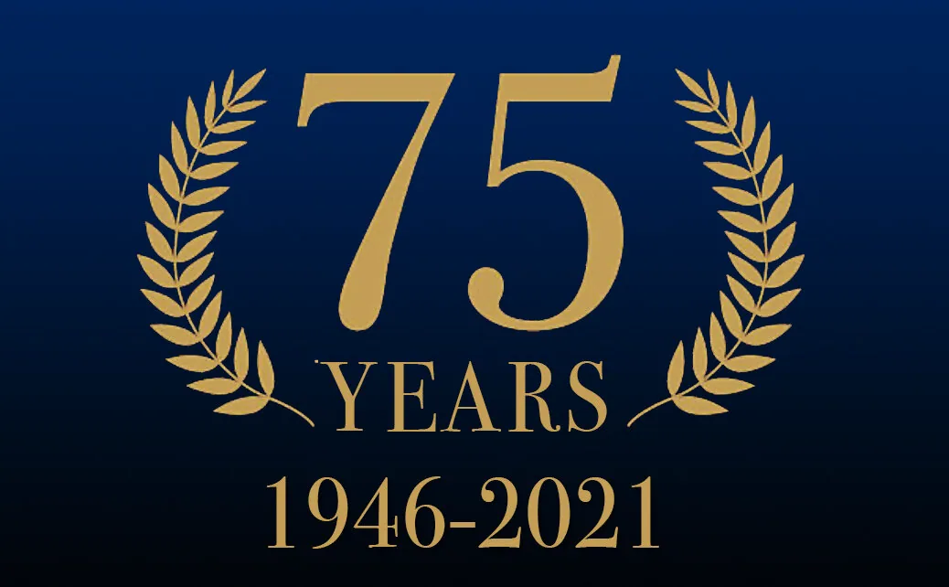 UK Sailmakers 75 Years 1946-2021 anniversary emblem in gold laurels on navy